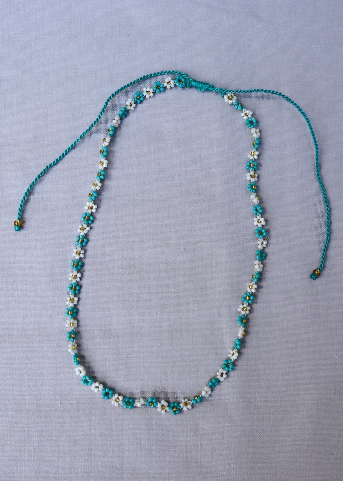 THE FLOWER NECKLACE
