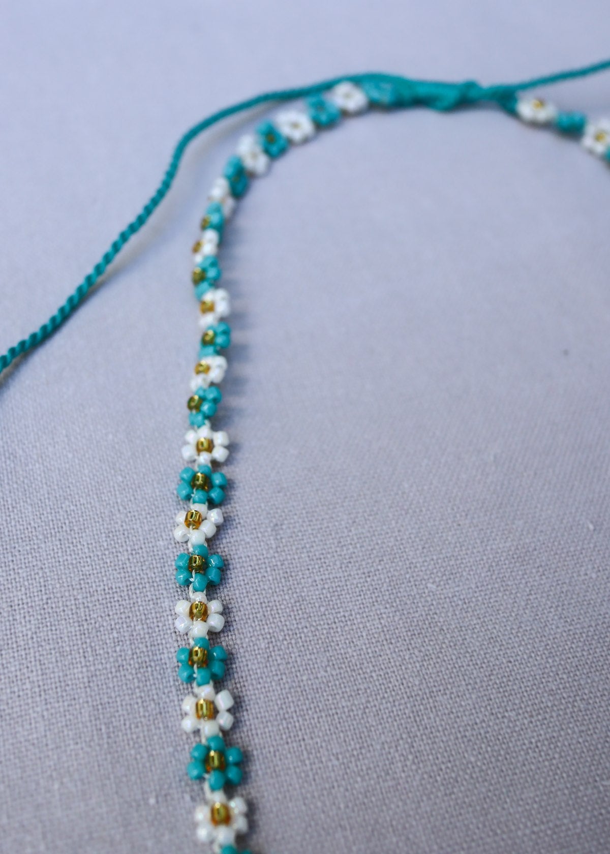 THE FLOWER NECKLACE