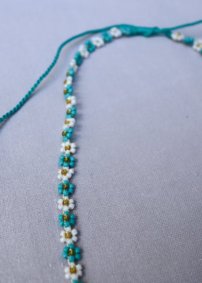 THE FLOWER NECKLACE
